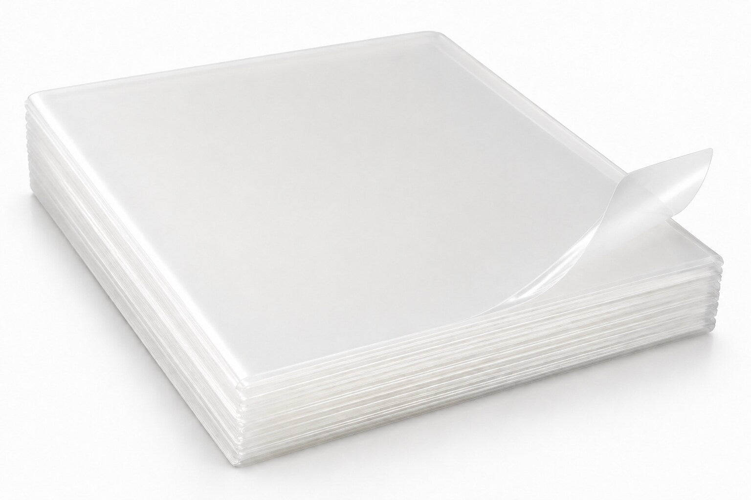 High-resolution close-up of milky-clear glossy laminating pouches showing crisp individual layers and one correctly lifted corner